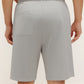 back of man in grey shorts