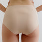 back of a woman wearing a nude brief