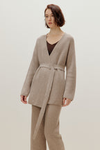woman in knitted brown cardigan and pants