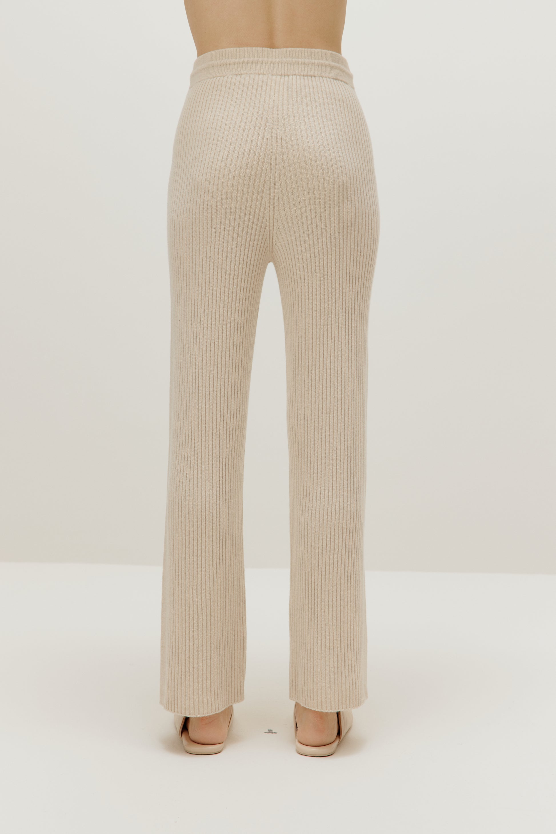 Alo Yoga Ribbed Cashmere High-Waist Flare Pants in Ivory