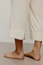 Close-up of lower part of blue pajama pants
