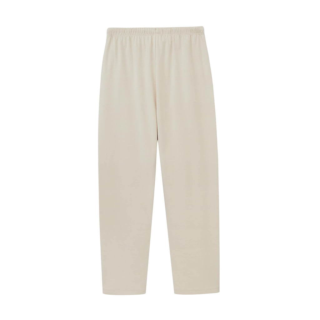 a pair of cream color pants 