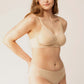 Woman wearing beige bra with plunge neckline and center cutout and matching briefs