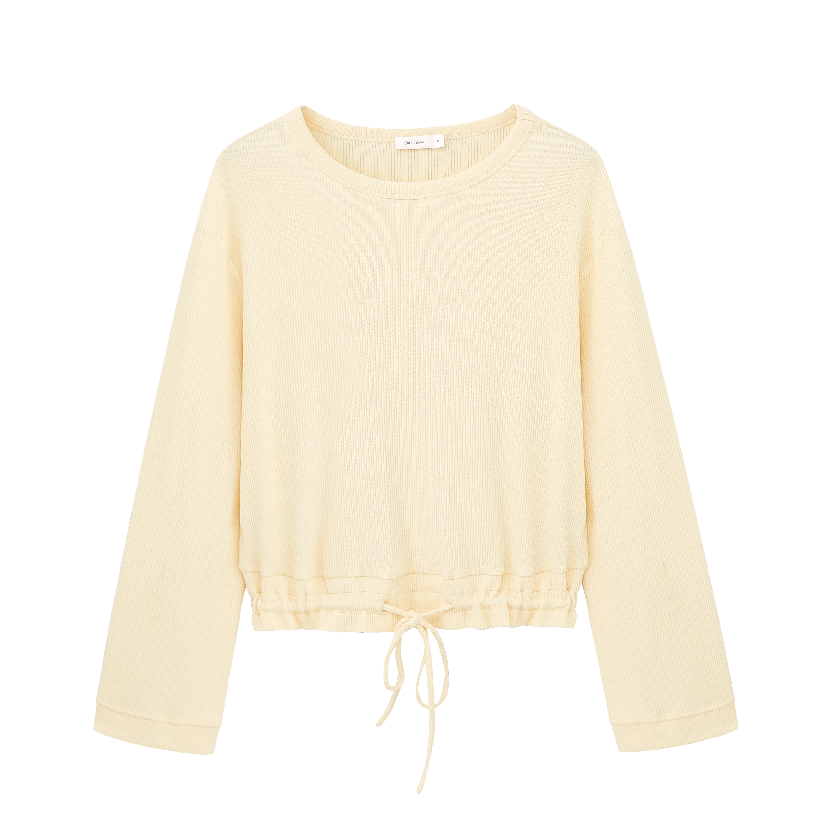 flat lay image of yellow pajama top