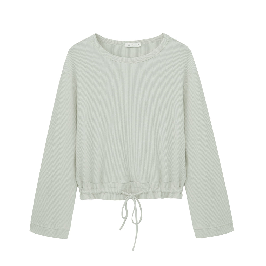 flat lay image of mint pajama top