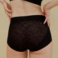 back of woman in black brief