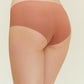 Back view of woman wearing rust-colored underwear