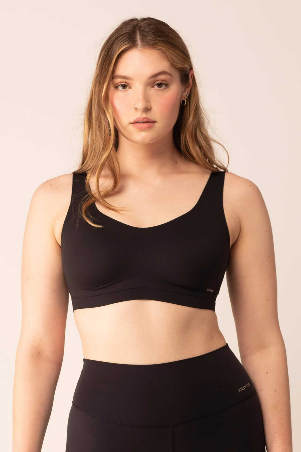woman wearing black bra