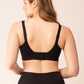 back of woman in black bra and bottoms