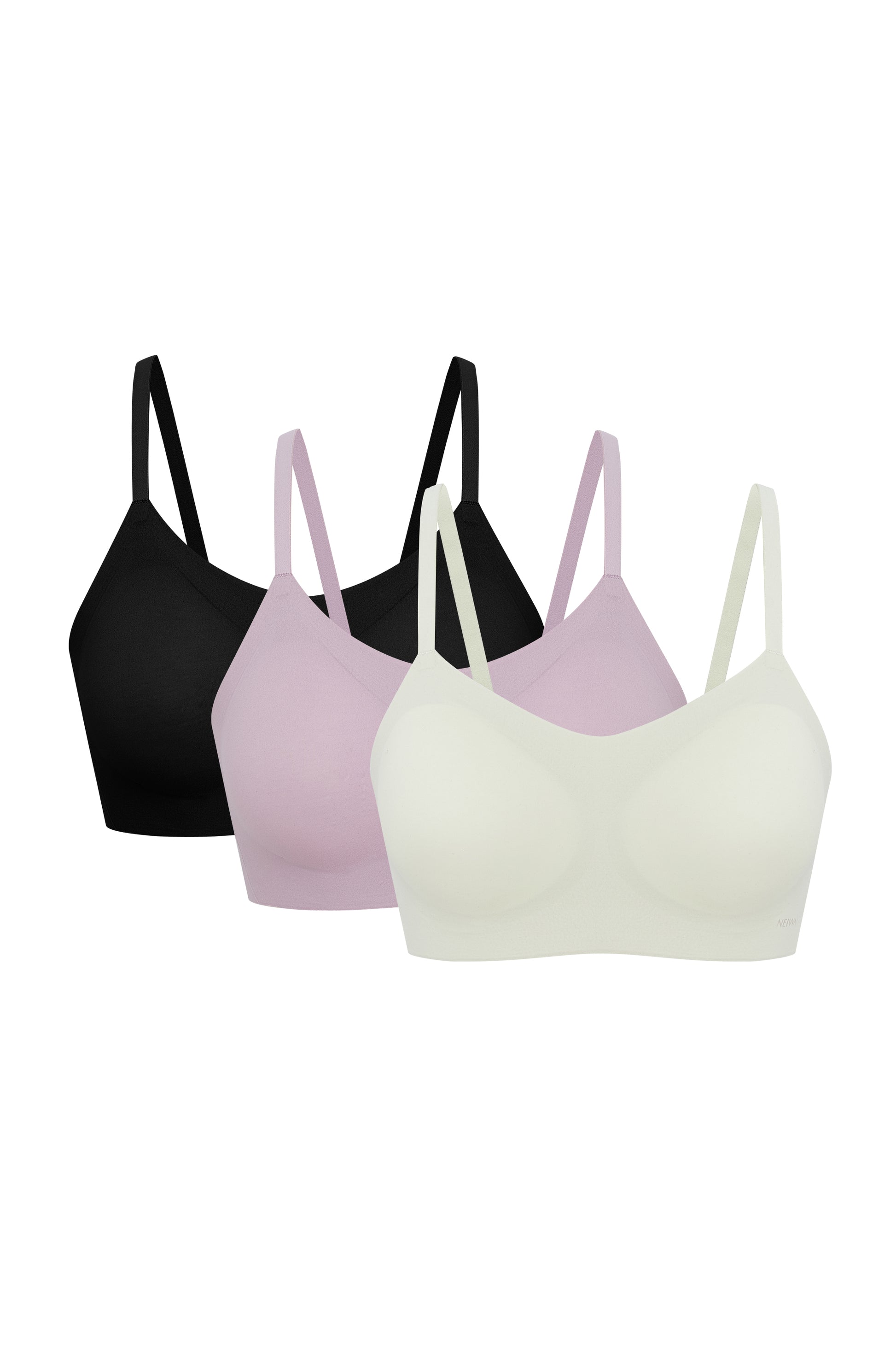 Flat lay image of off-white, lavender, and black bras