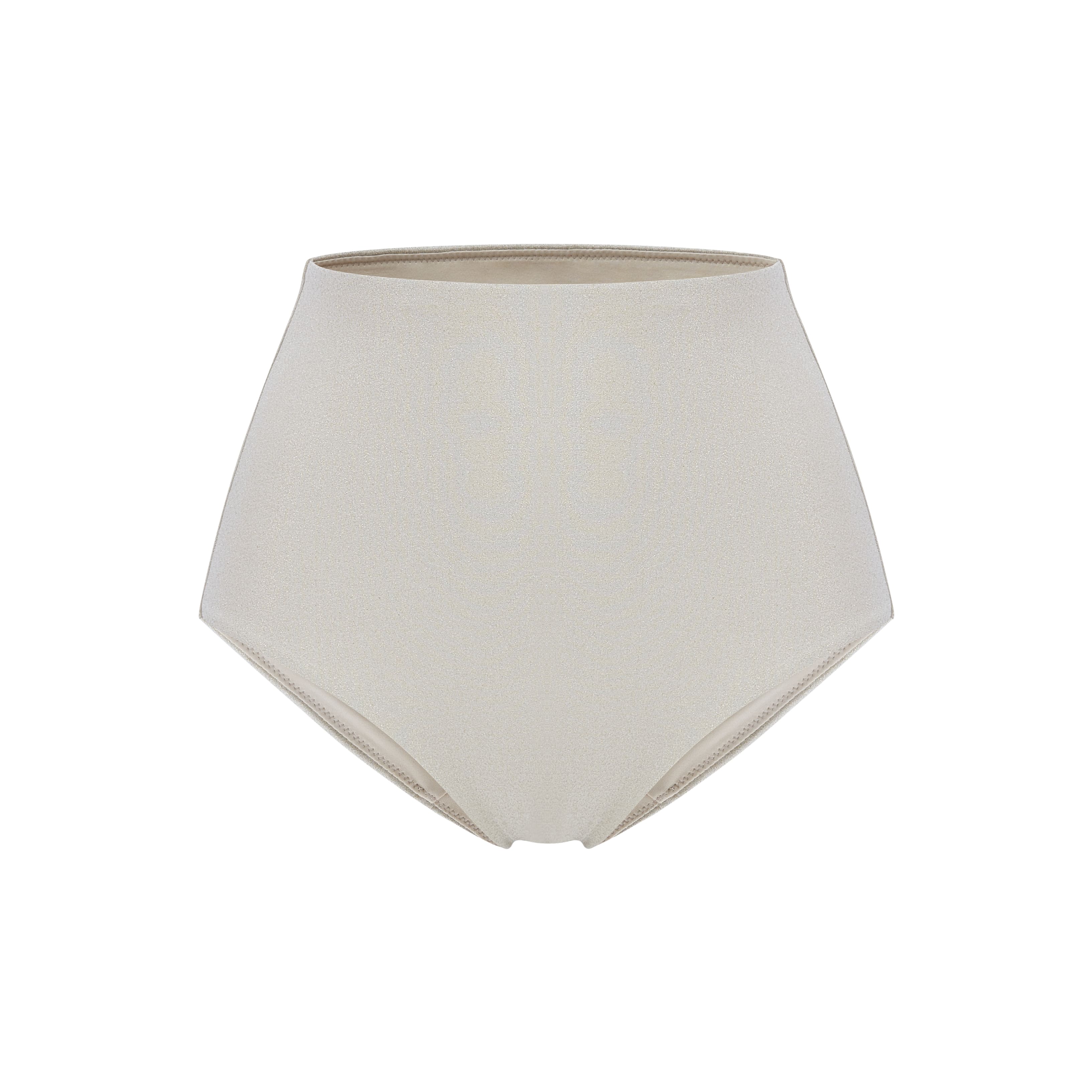 Flat lay image of gold high waisted bikini bottom