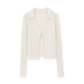 Flat lay image of off white knit cardigan with collar