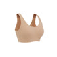 Flat lay image of side view of nude colored bra with thick straps