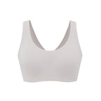 Flat lay image of off-white bra with thick straps
