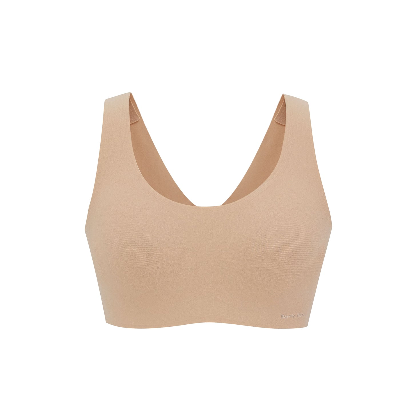 Flat lay image of nude colored bra with thick straps