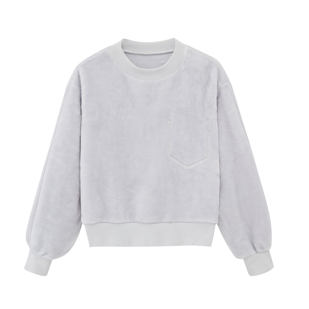 a light blue fleece pull over top