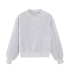 a light blue fleece pull over top