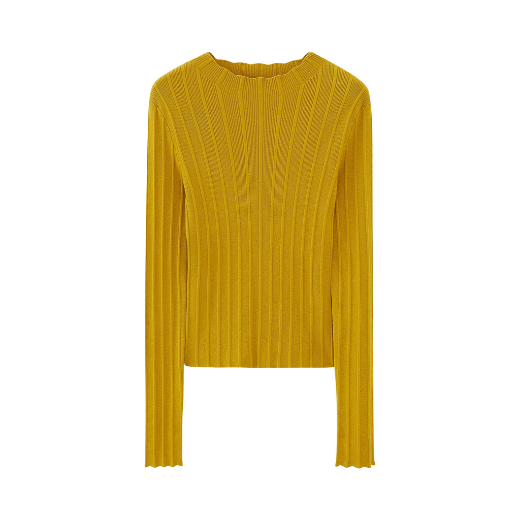 Flat lay of golden yellow sweater