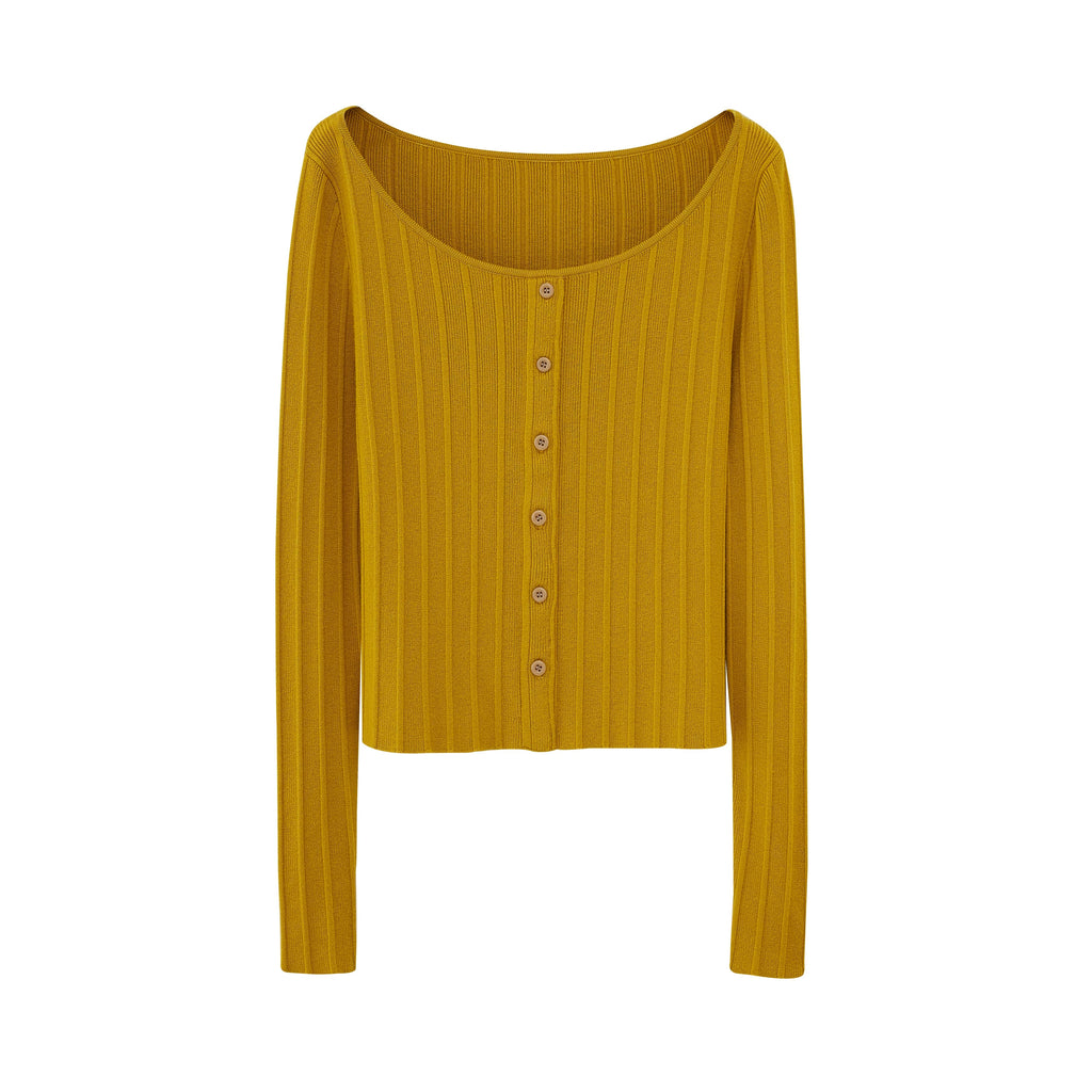 Flat lay of golden yellow sweater