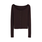 Flat lay of brown sweater