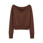 flat lay of brown top
