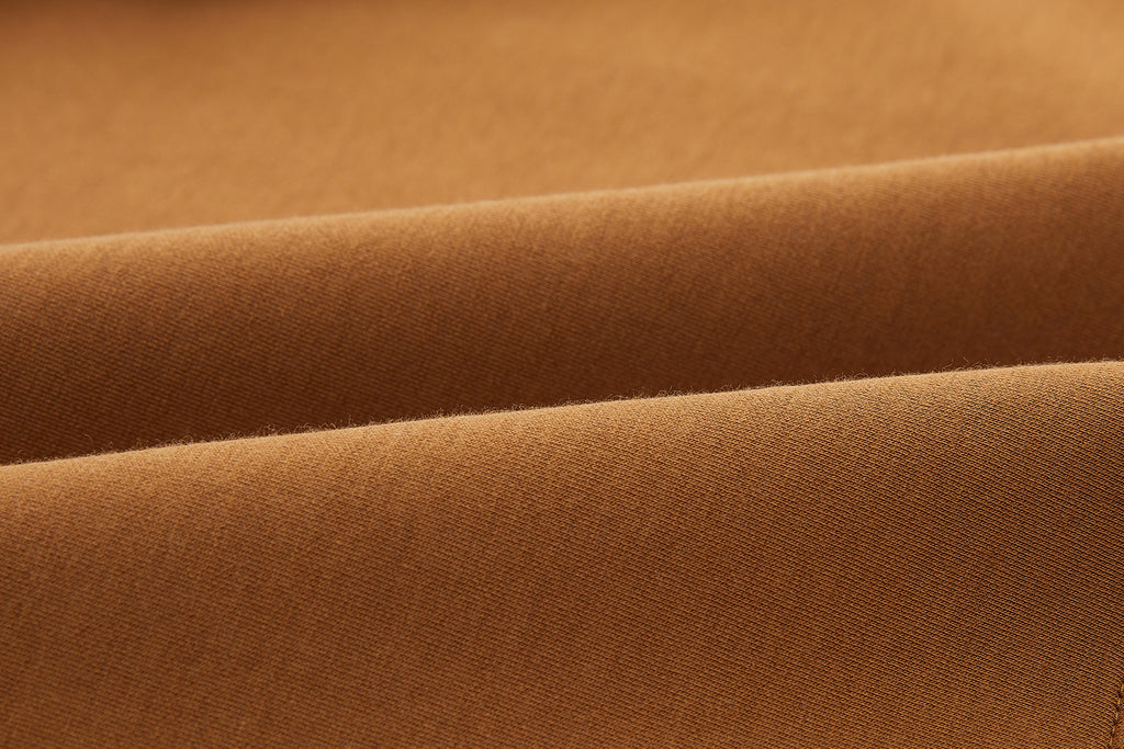 Close up of brown top