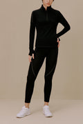 women in black active top and leggings