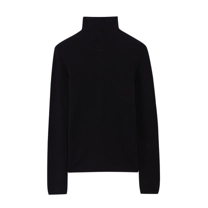 flat lay of black turtleneck sweater