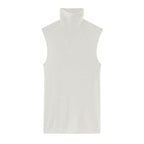 flat lay of white knitted sleeveless turtleneck top