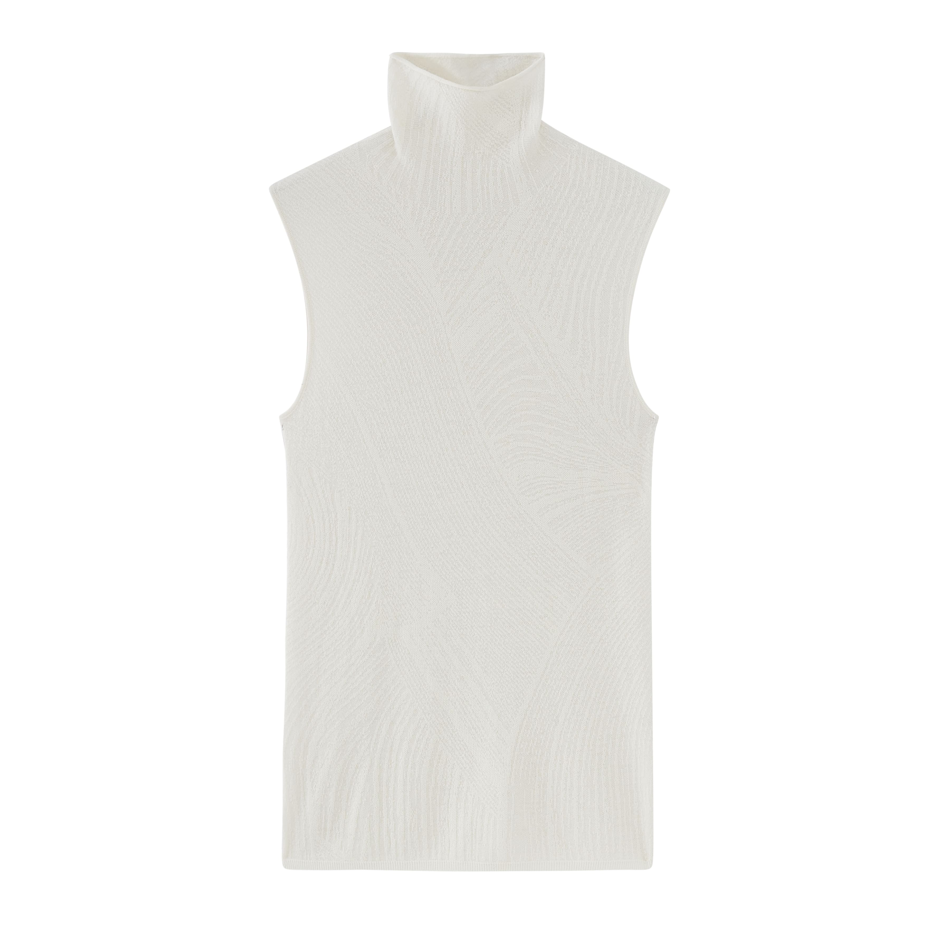 flat lay of white knitted sleeveless turtleneck top
