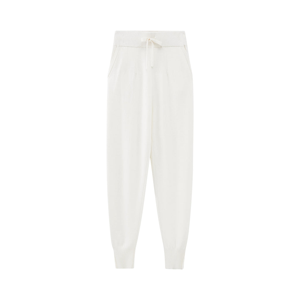 flat lay of white knitted joggers
