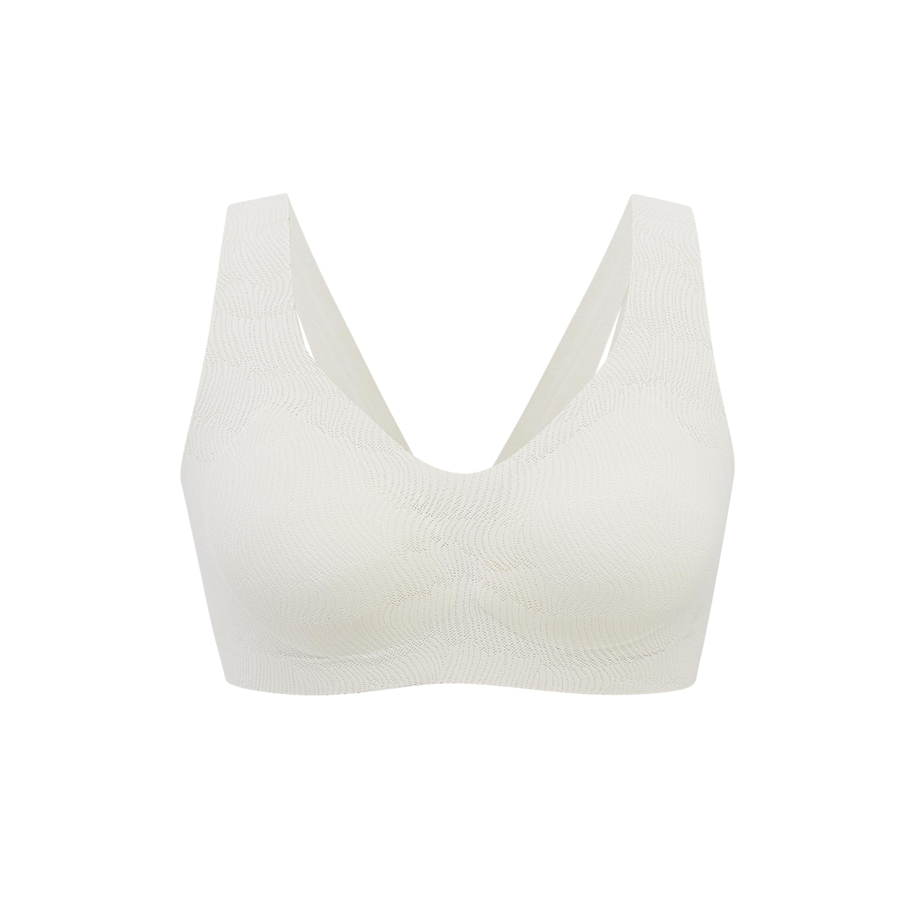 flat lay of white bra