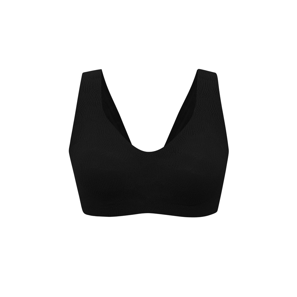 flat lay of black bra