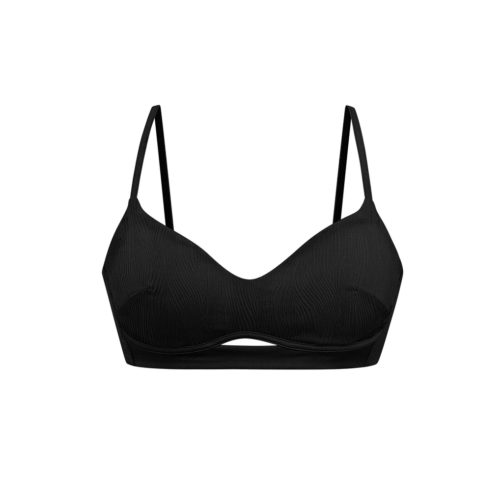 flat lay of black bra