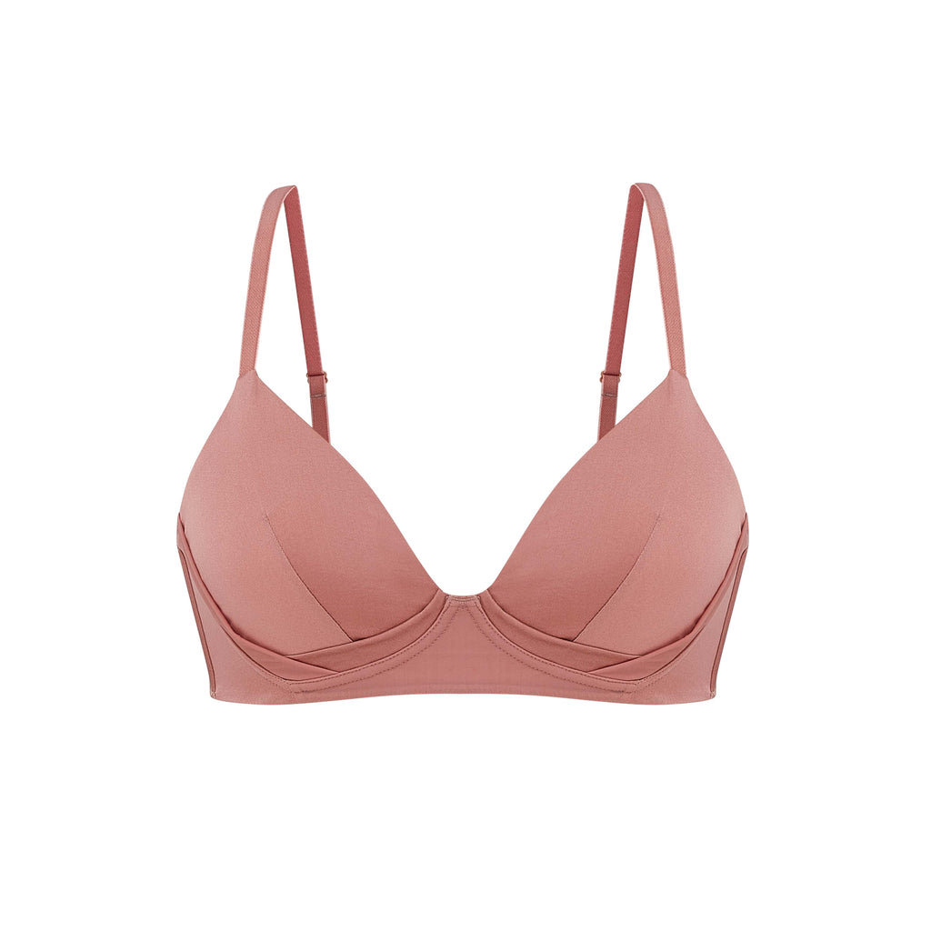 Flat lay of pink silk bra