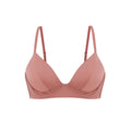 Flat lay of pink silk bra