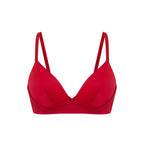 Flat lay of red silk bra