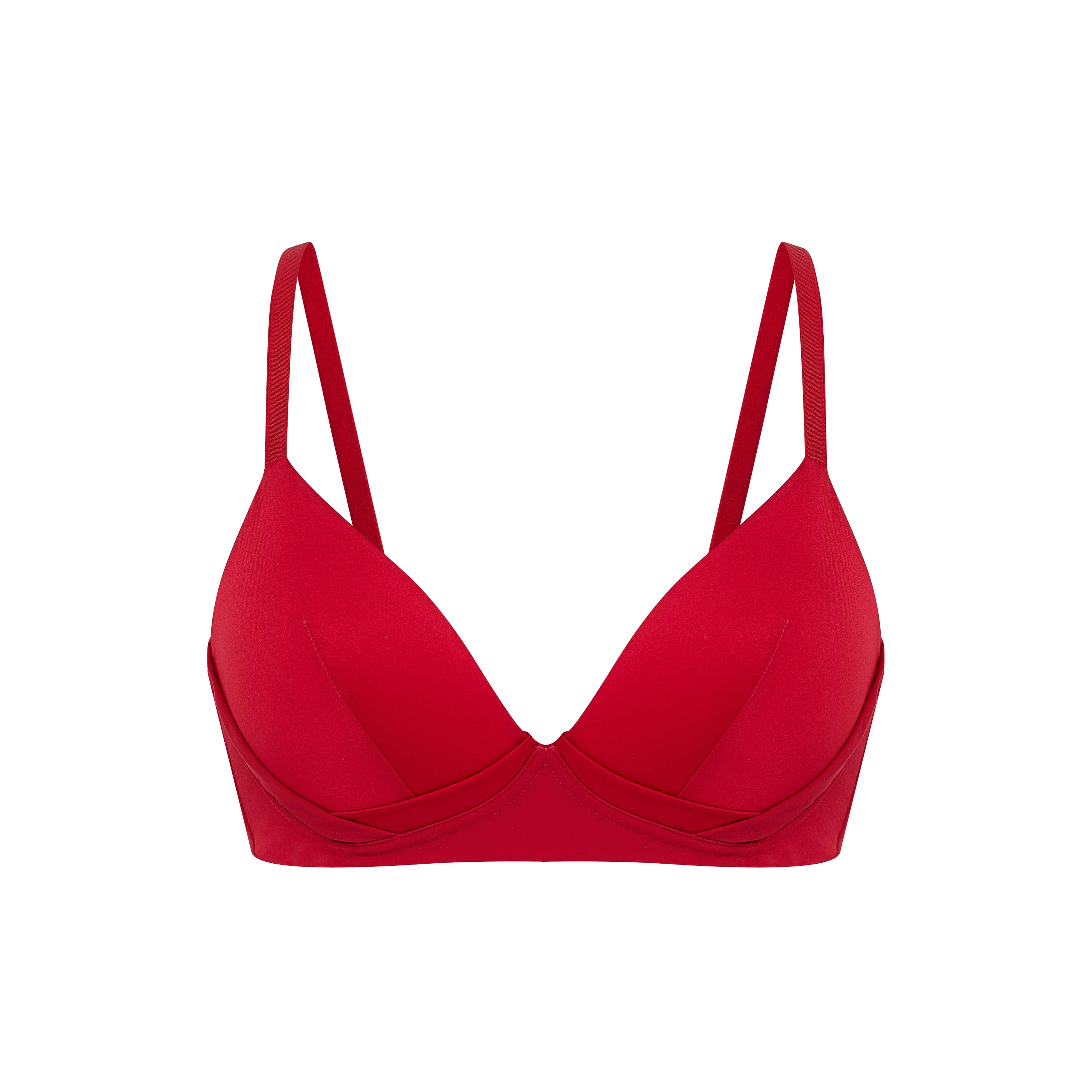 Flat lay of red silk bra