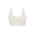 flat lay of an off white bra. Vanilla Bean color.