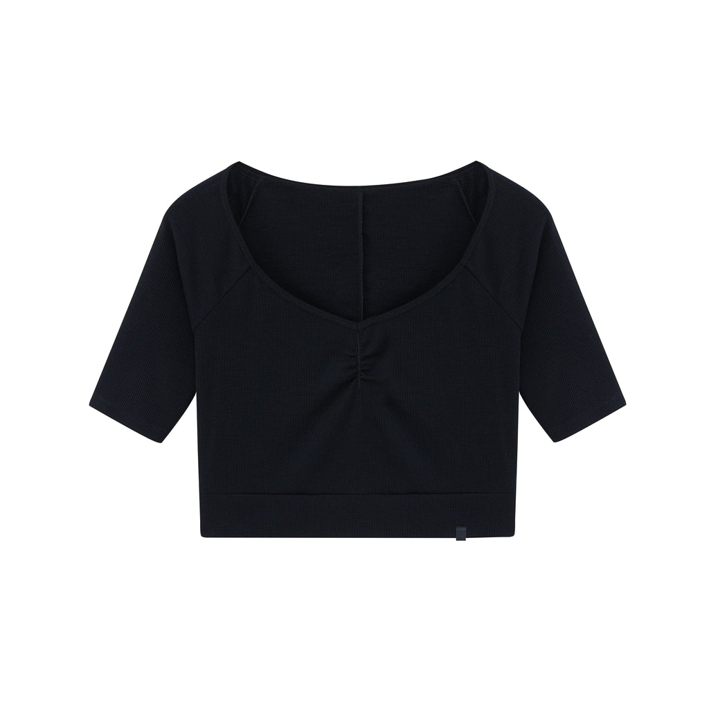 Flat lay of black V-neck sweater.
