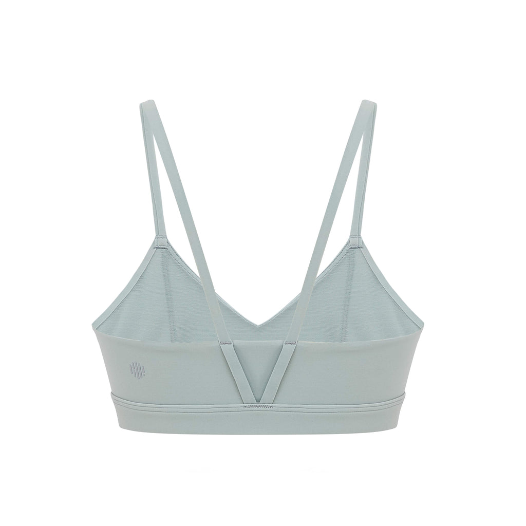 Flat lay of inside of aqua sports bra