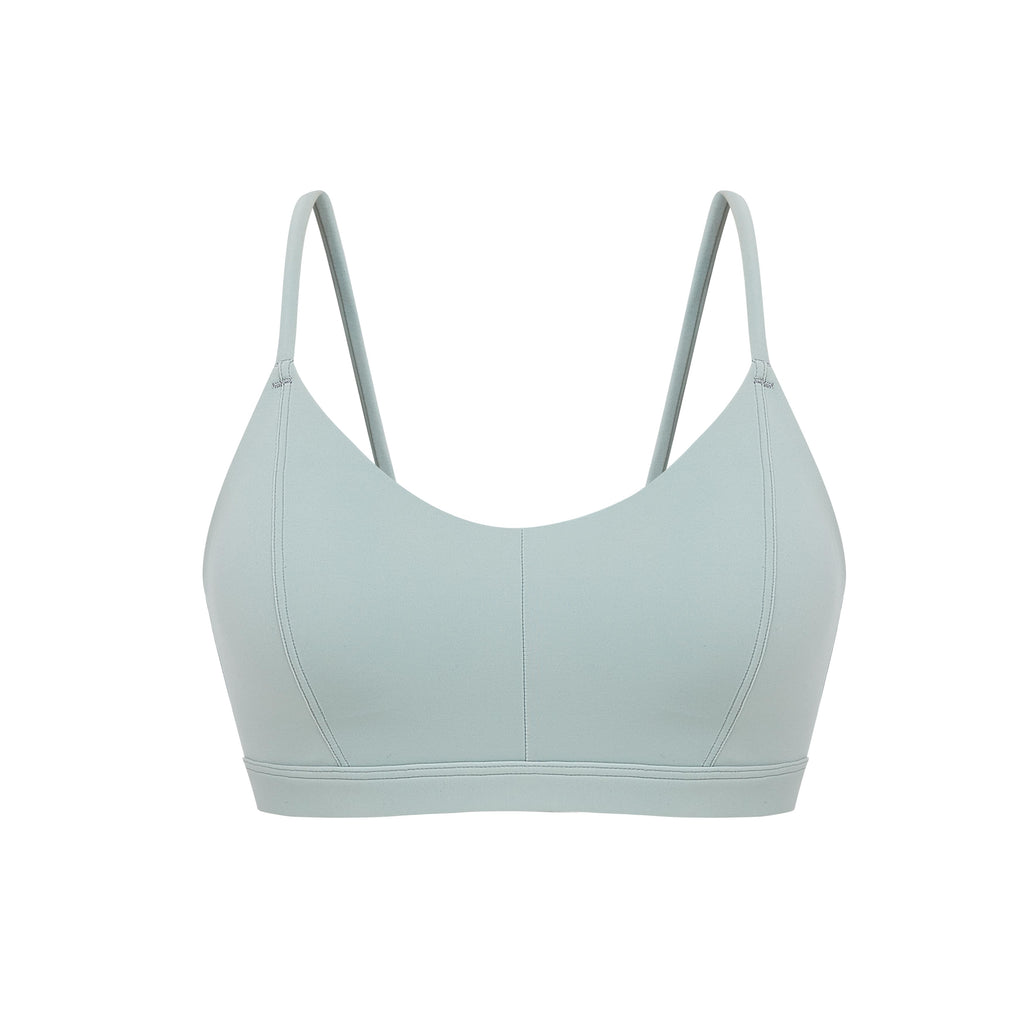 Flat lay of aqua sports bra