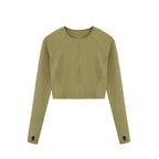Flat lay of green cropped top.