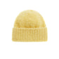 back of yellow beanie flat lay