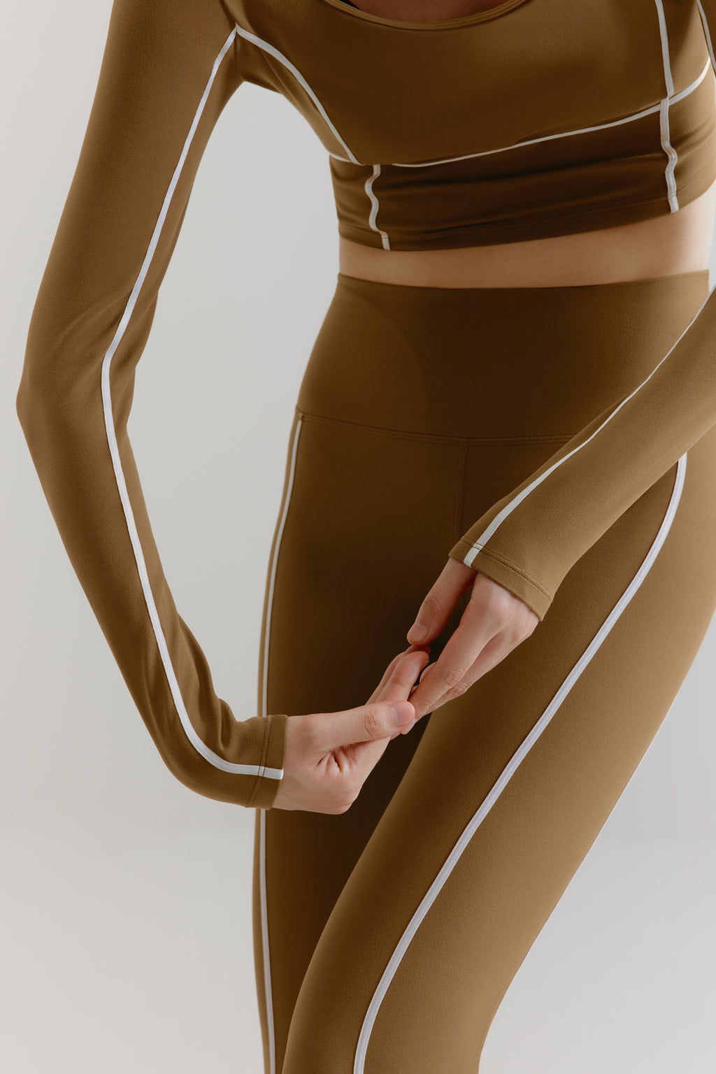 close up of the U-Neck Long Sleeve Top and leggings