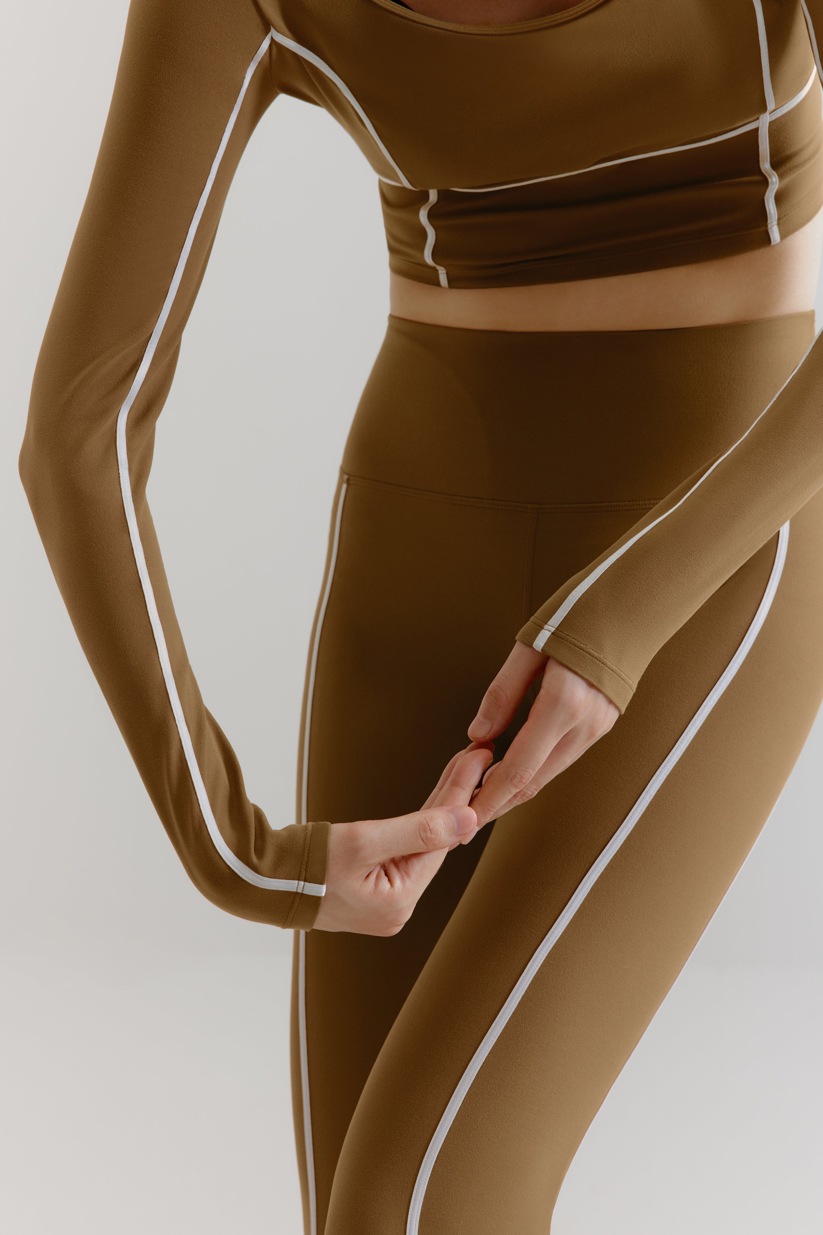 close up of the U-Neck Long Sleeve Top and leggings