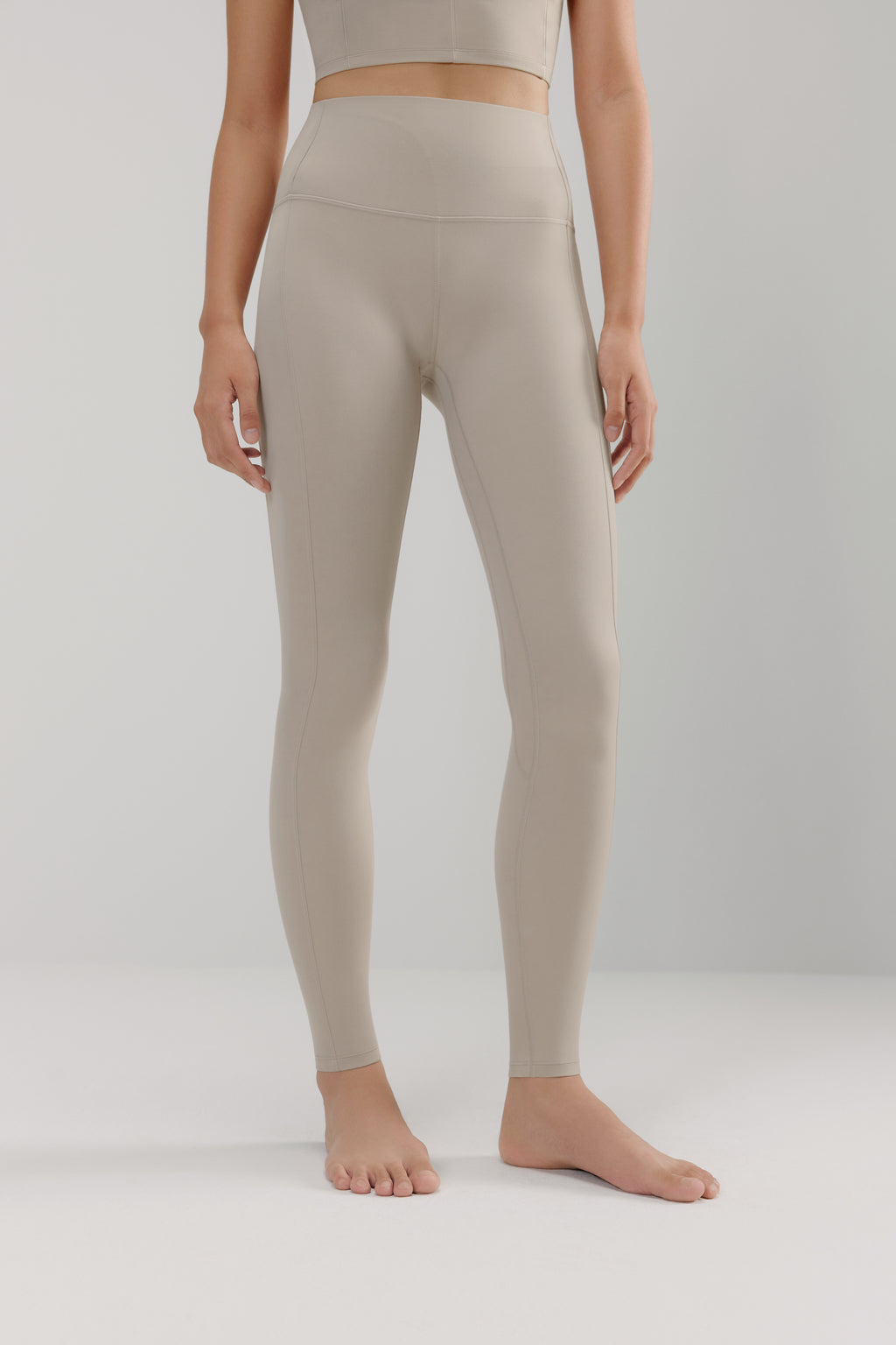 woman in grey leggings