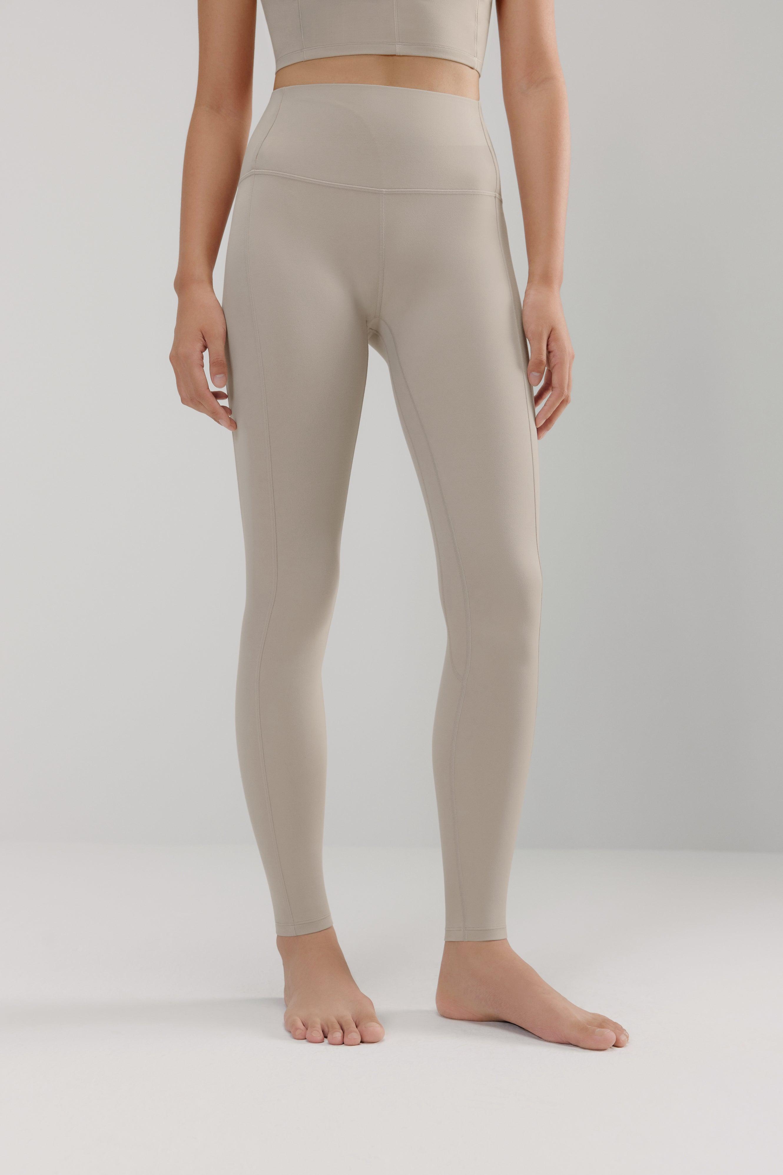 woman in grey leggings