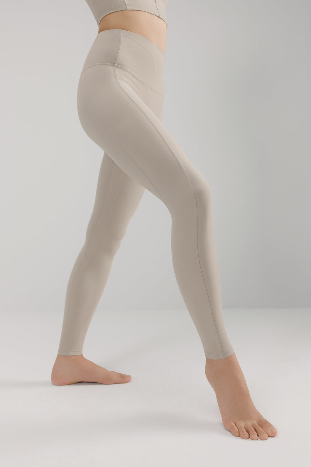 woman in grey leggings