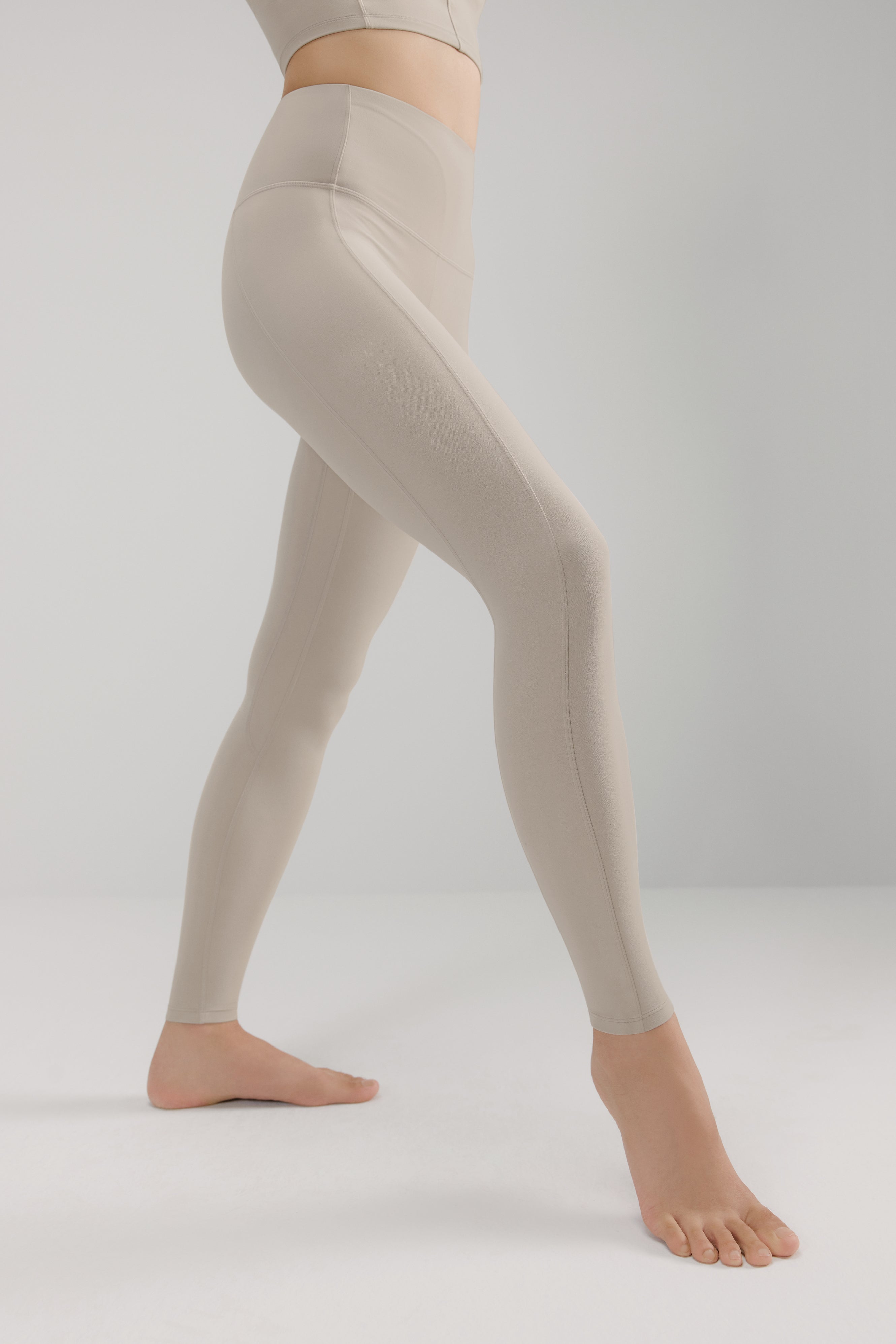 woman in grey leggings